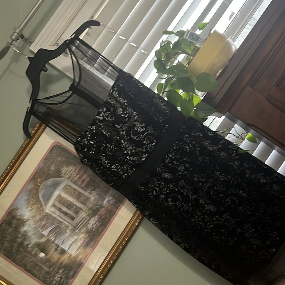 Stylish Black Dress with Silver Accents